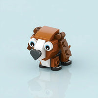 Toy figure made of interlocking bricks on a light blue background