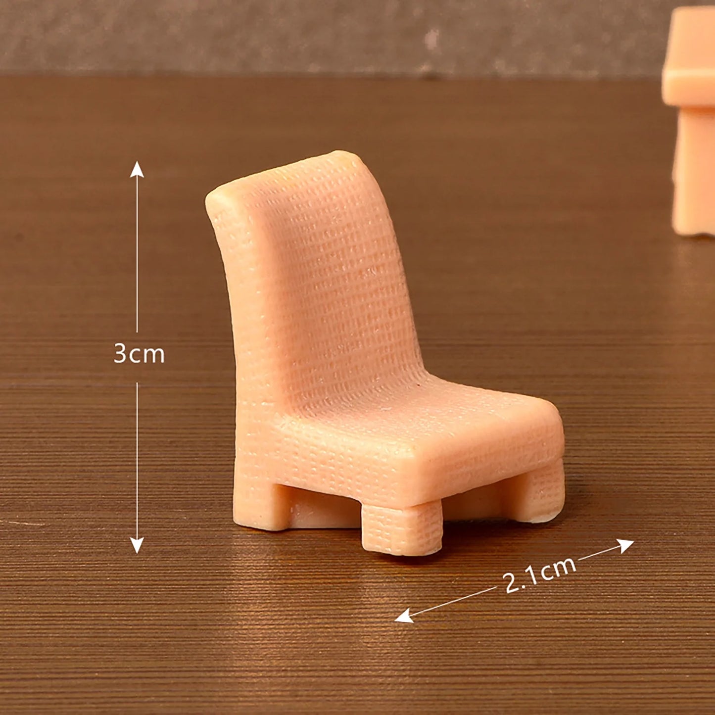 Miniature Toy Chair (1pc) on the brown wooden background.