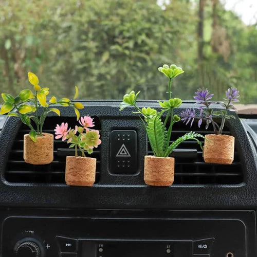 Multiple Artificial Plant Car Air Vent Clip placed on car vent
