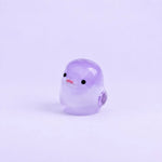 Miniature Glow Chick Assorted (1pc) displayed on a light purple background