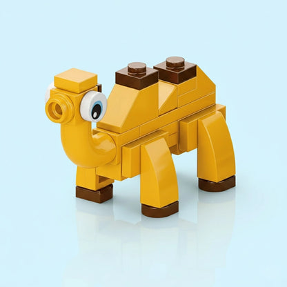 Yellow and brown Camel Building Block animal figure on a light blue background