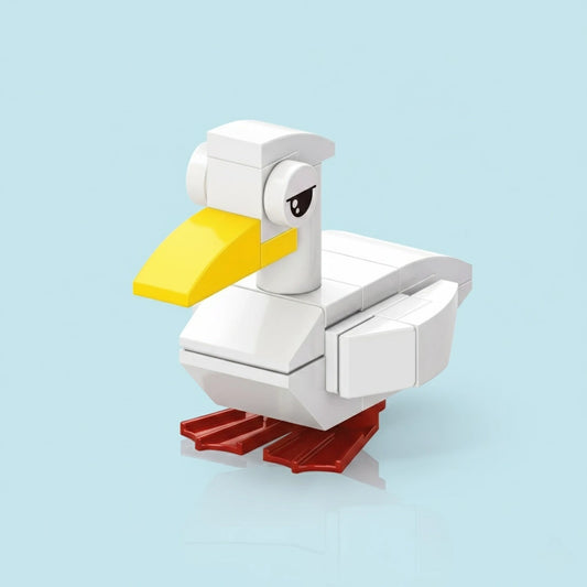 Toy duckling building block made on a light blue background