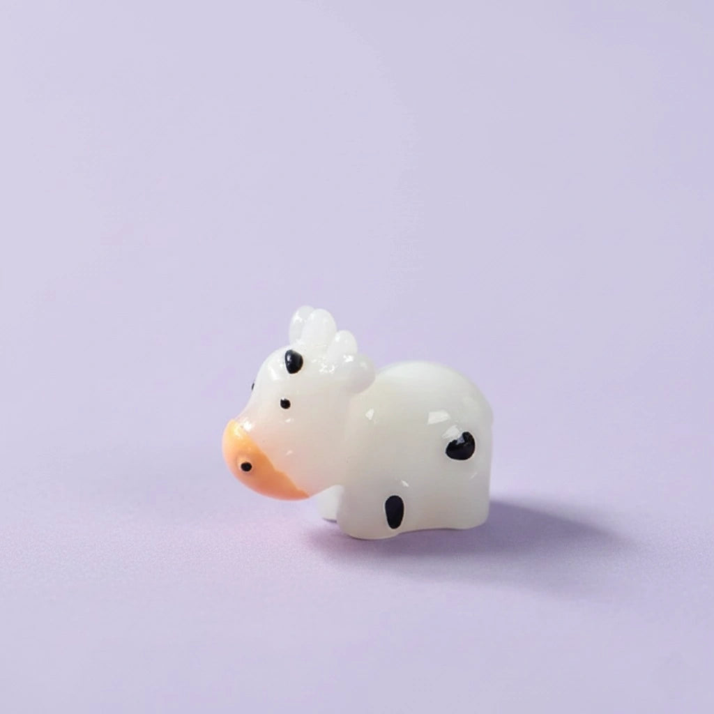 Miniature Cow Assorted (1pc) on white background.