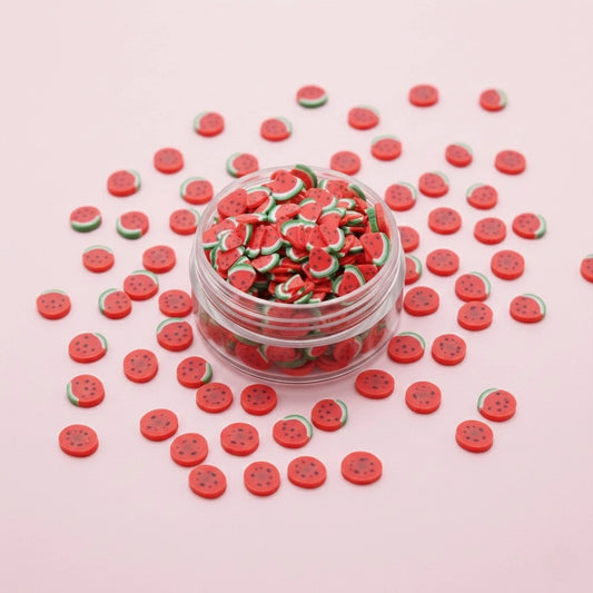 Miniature Polymer Clay Watermelon (10pcs) on the light pink background.