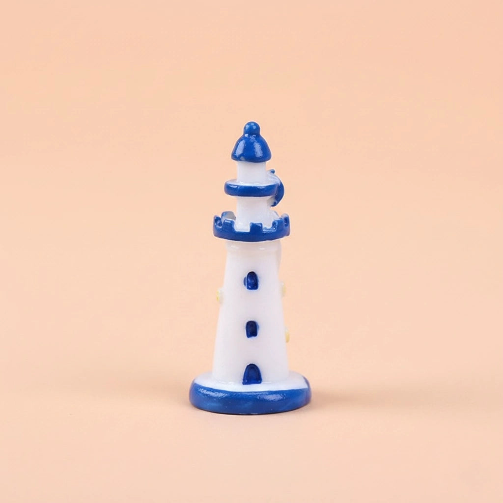 Miniature Sea Side Watch Light Tower (1pc) on the light peached background.