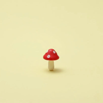Miniature Garden Mushroom (1Pc) on the beige background.