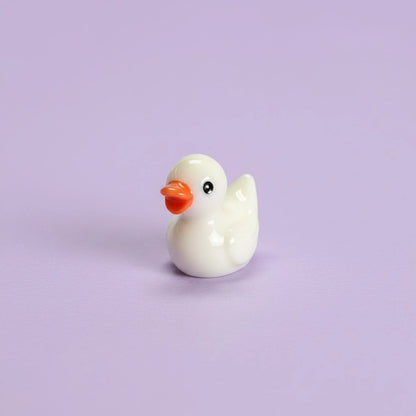 Miniature Ducks (1pc) on the light background.