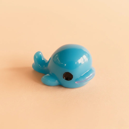 Miniature Dolphin (1pc) on the light orange background.