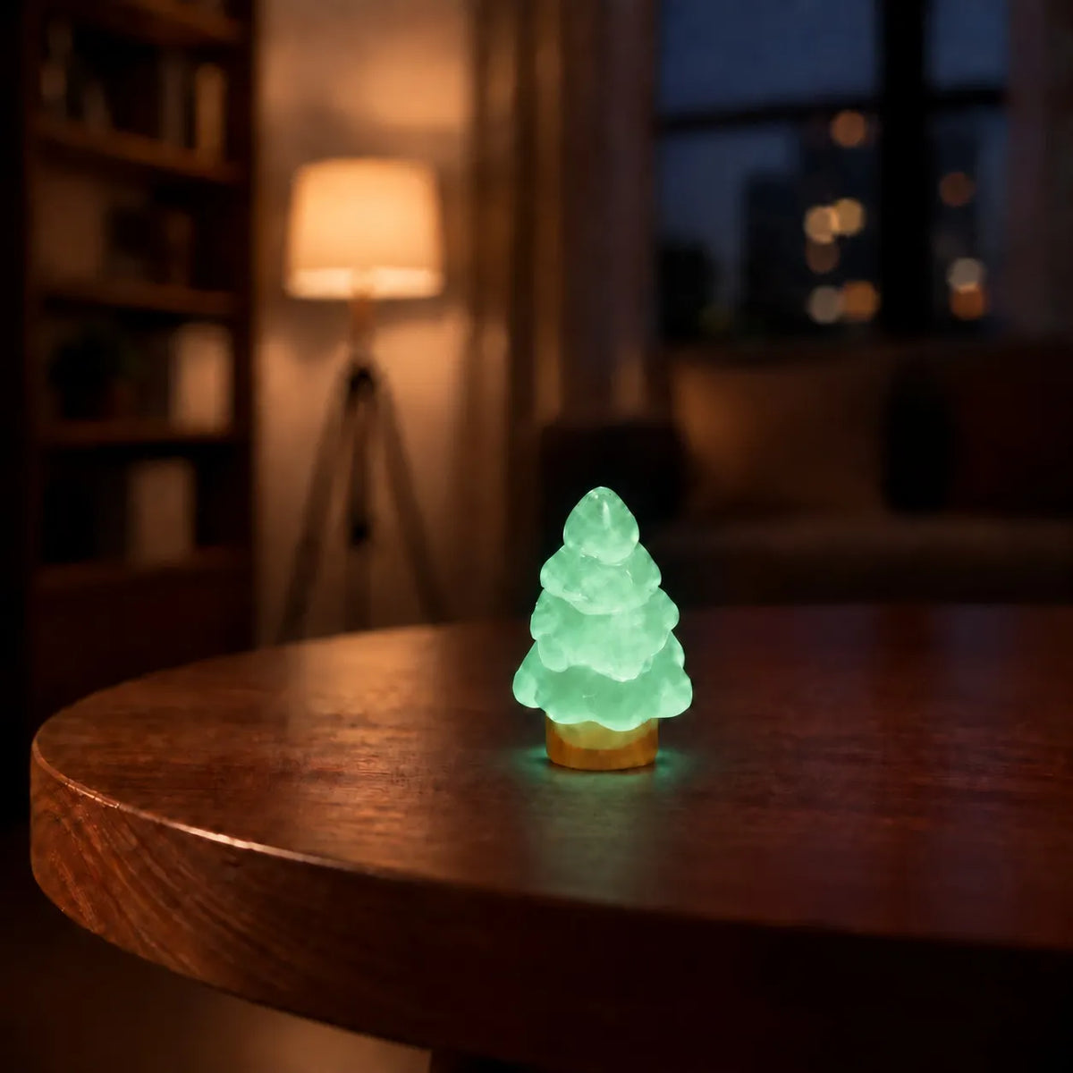 Miniature Glow Christmas Tree Assorted (1pc) glowing on a wooden table