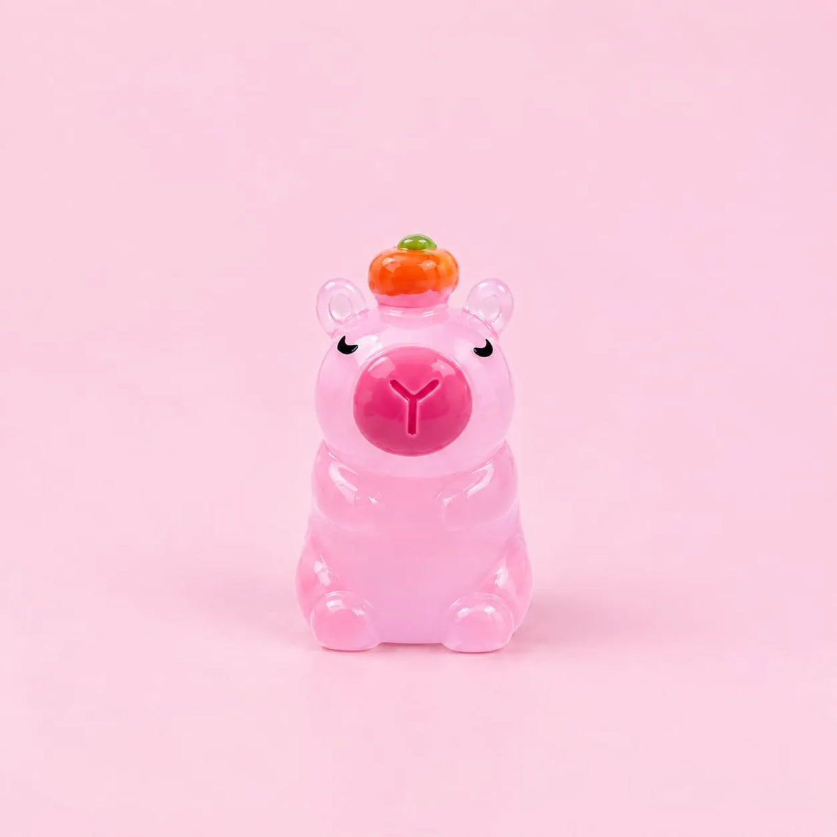 Miniature Glow Cute Pig Assorted (1pc) displayed on a pink background