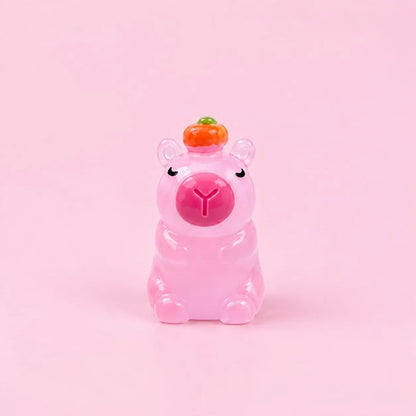 Miniature Glow Cute Pig Assorted (1pc) displayed on a pink background