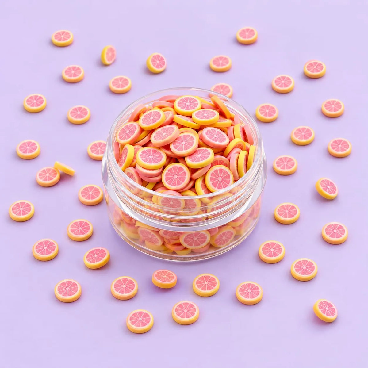 Miniature Polymer Clay Pink Orange (10pcs) displayed on a light purple background