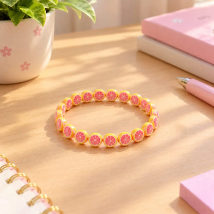 Miniature Polymer Clay Pink Orange (10pcs) used to create a colorful bracelet