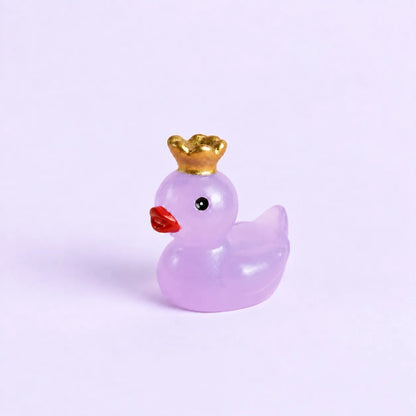 Miniature Glow Crown Duck Assorted (1pc) displayed on a light purple background.