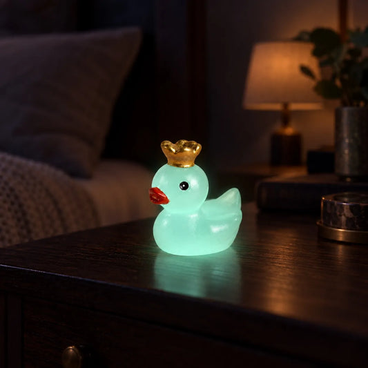 Miniature Glow Crown Duck Assorted (1pc) glowing in green on a table