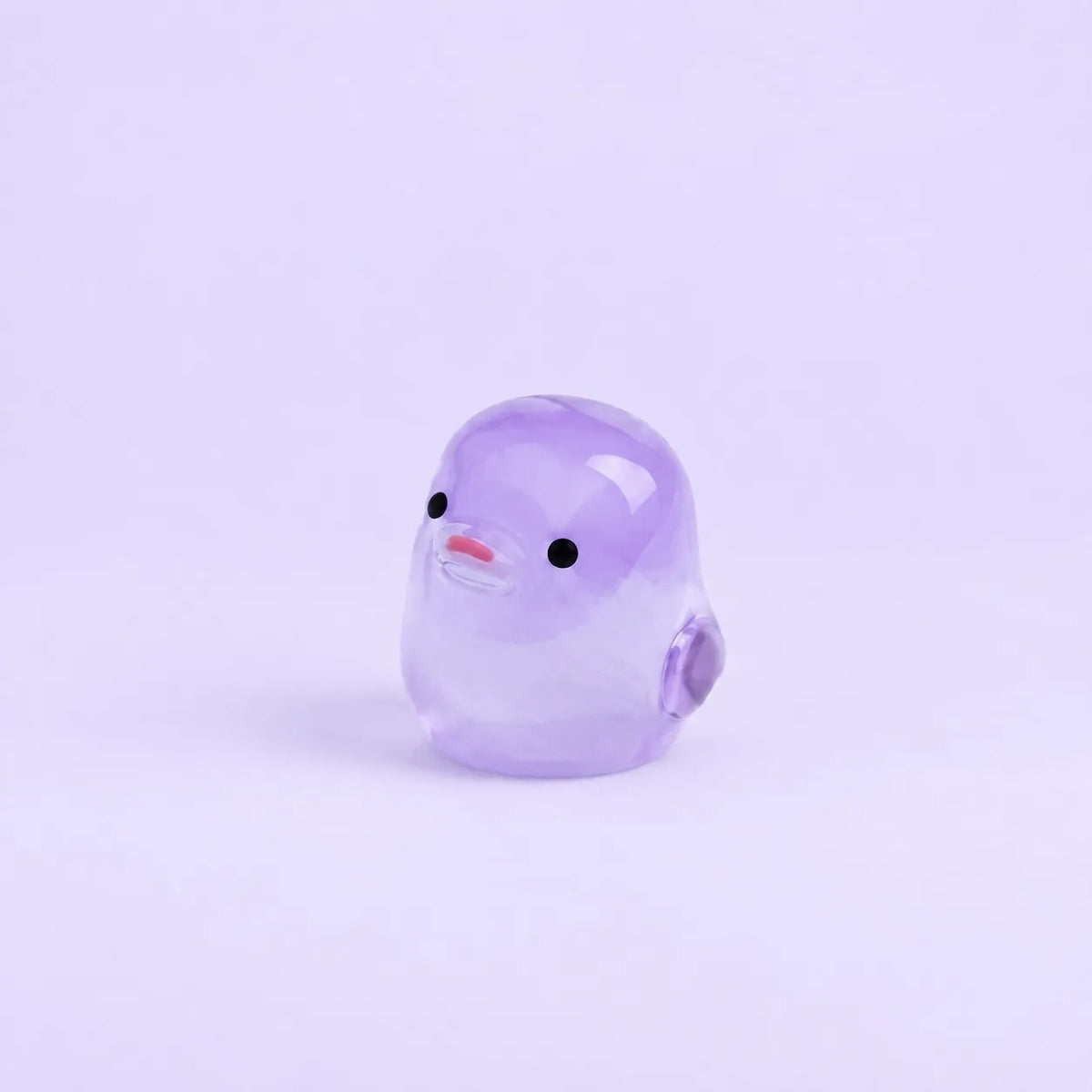 Miniature Glow Chick Assorted (1pc) displayed on a light purple background