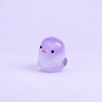 Miniature Glow Chick Assorted (1pc) displayed on a light purple background