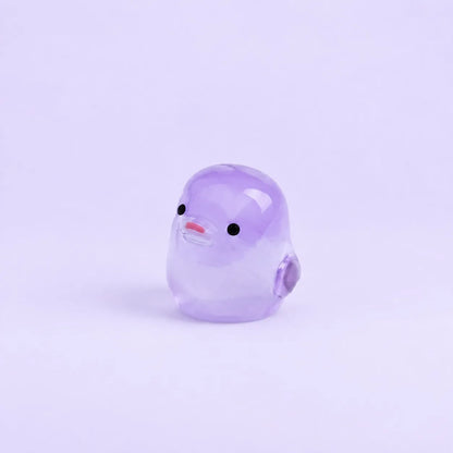 Miniature Glow Chick Assorted (1pc) displayed on a light purple background