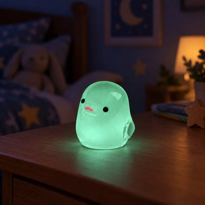 Miniature Glow Chick Assorted (1pc) glowing in green on a table