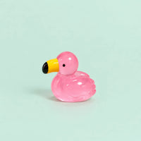 Miniature Glow Swan Assorted (1pc) displayed on a mint green background