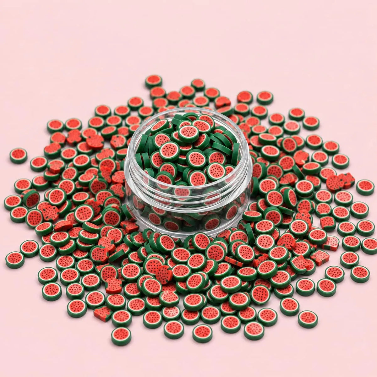 Miniature Polymer Clay Full Watermelon Slice (10pcs) displayed on a pink background