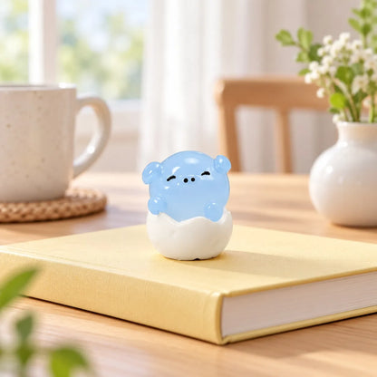 Miniature Glow Eggshell Animal Assorted (1pc) displayed on a dining table.