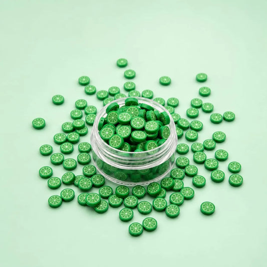 Miniature Polymer Clay Green Orange (10pcs) displayed on a mint green background