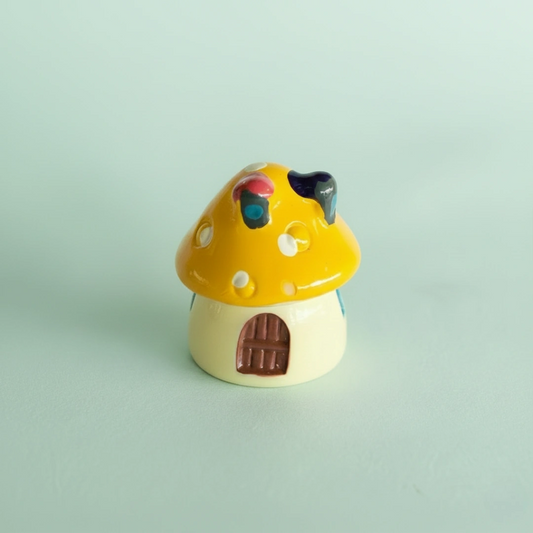 Miniature Mushroom House Assorted on the light background.