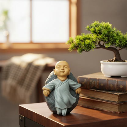 Miniature Chinese Feng Shui Monks (1pc) on the table.