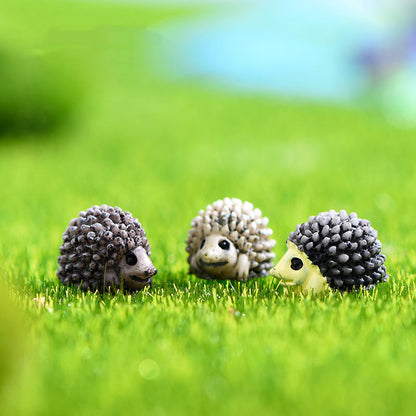 Pair of three Miniature Porcupine on the green grass.