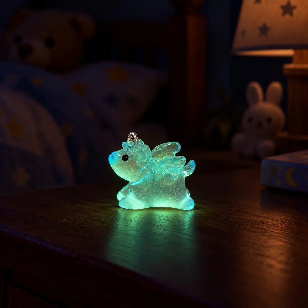 Miniature Glow Unicorn Horse Assorted (1pc) glowing on a wooden table in a dark setting