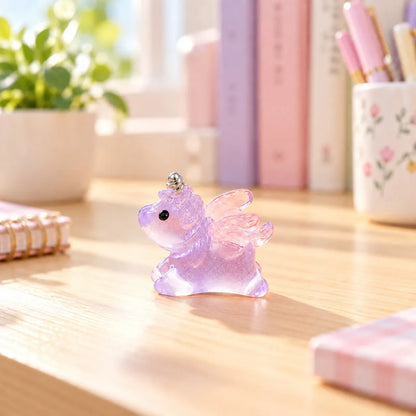 Miniature Glow Unicorn Horse Assorted (1pc) displayed on a desk near a window