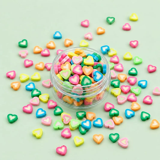 Miniature Polymer Clay Heart Fimo Assorted (10pcs) displayed on a mint green background