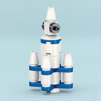 Multi Stage Space Rocket Building Block (1Pc) on the blue background.