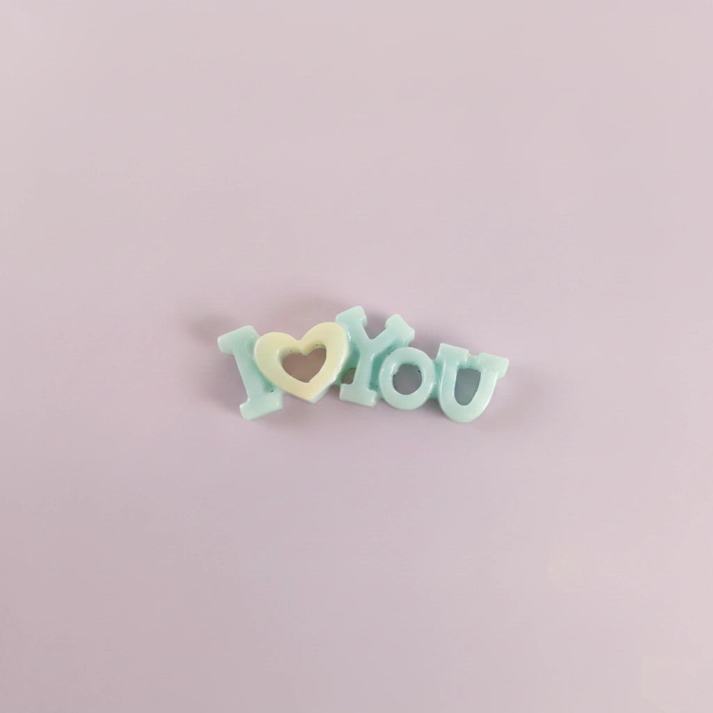 Miniature I Love You Toys (1pc) on the light background.