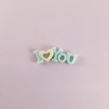 Miniature I Love You Toys (1pc) on the light background.