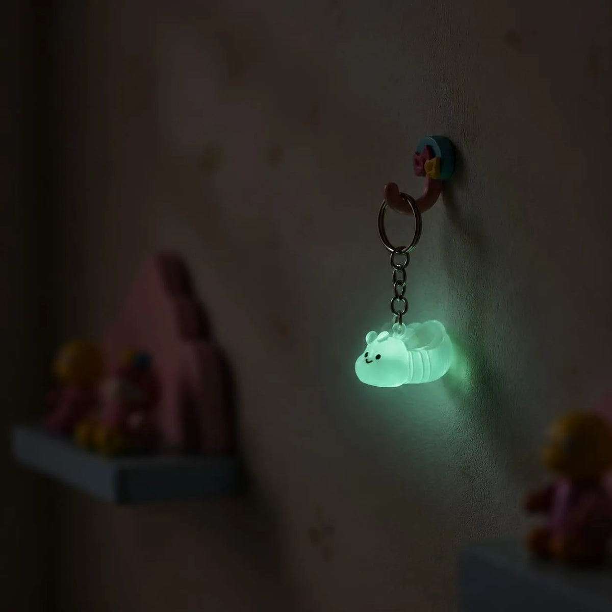 Miniature Glow Little Bee Assorted (1pc) glowing in a dark setting