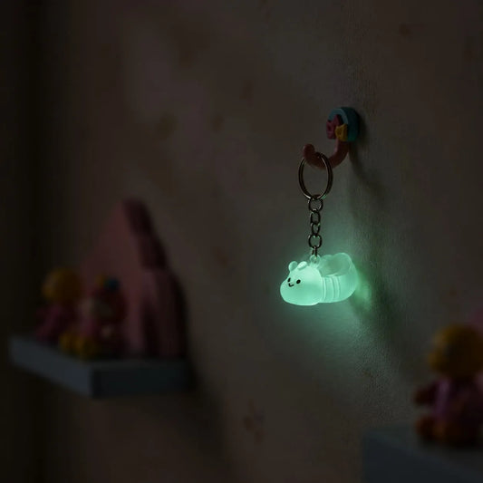 Miniature Glow Little Bee Assorted (1pc) glowing in a dark setting