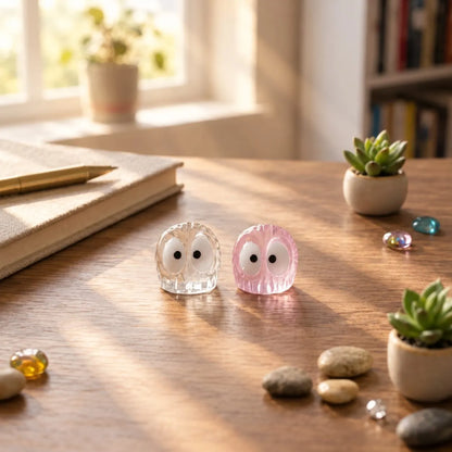 Miniature Glow Littlebriquet Assorted (1pc) displayed on a wooden table near window