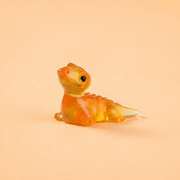 Miniature Glow Lizard Assorted (1pc) displayed on a peach background