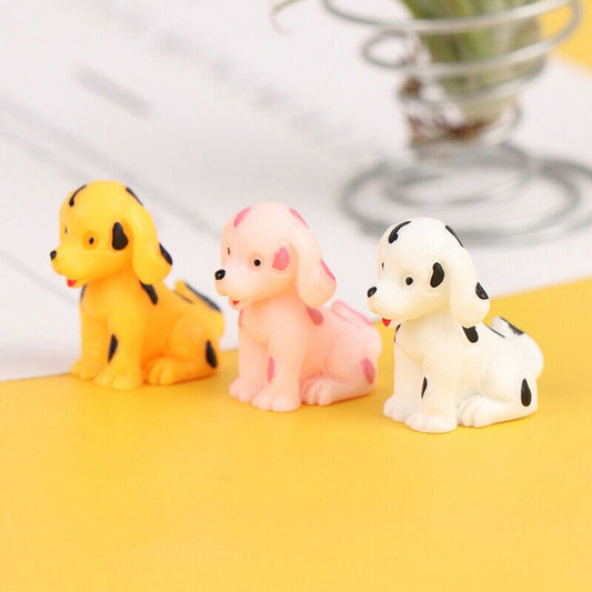 A cute Miniature Puppy on a yellow floor with blur background.