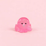Miniature Glow Octopus Assorted (1pc) on a light pink background