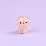 Miniature Glow Puppy Assorted (1pc) displayed on a dark green background