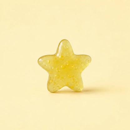 Miniature Glow Starfish Assorted (1pc) displayed on a light yellow background