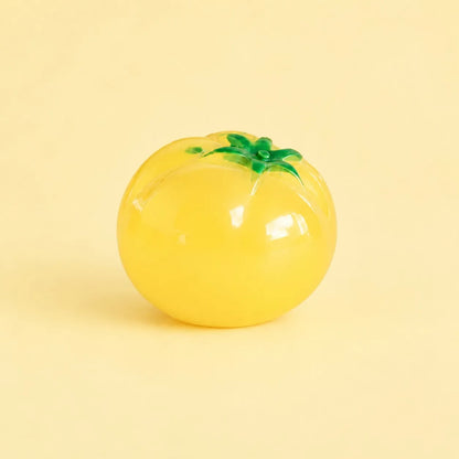Miniature Glow Tomato Assorted (1pc) displayed on a light yellow background