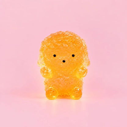 Miniature Glow Teddy Dog Assorted (1pc) displayed on a pink background