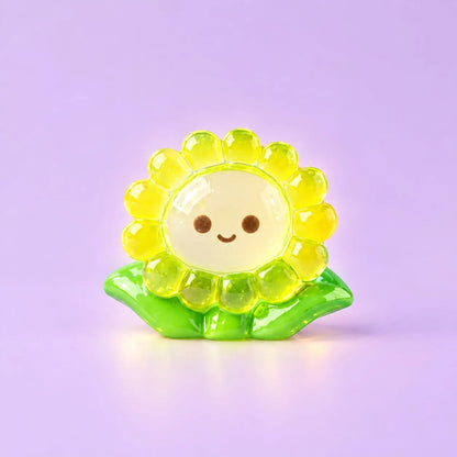 Miniature Glow Sunflower Assorted (1pc) displayed on a light purple background