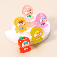 Miniature Glow Fruit Baby (1pc) on the light pink background.