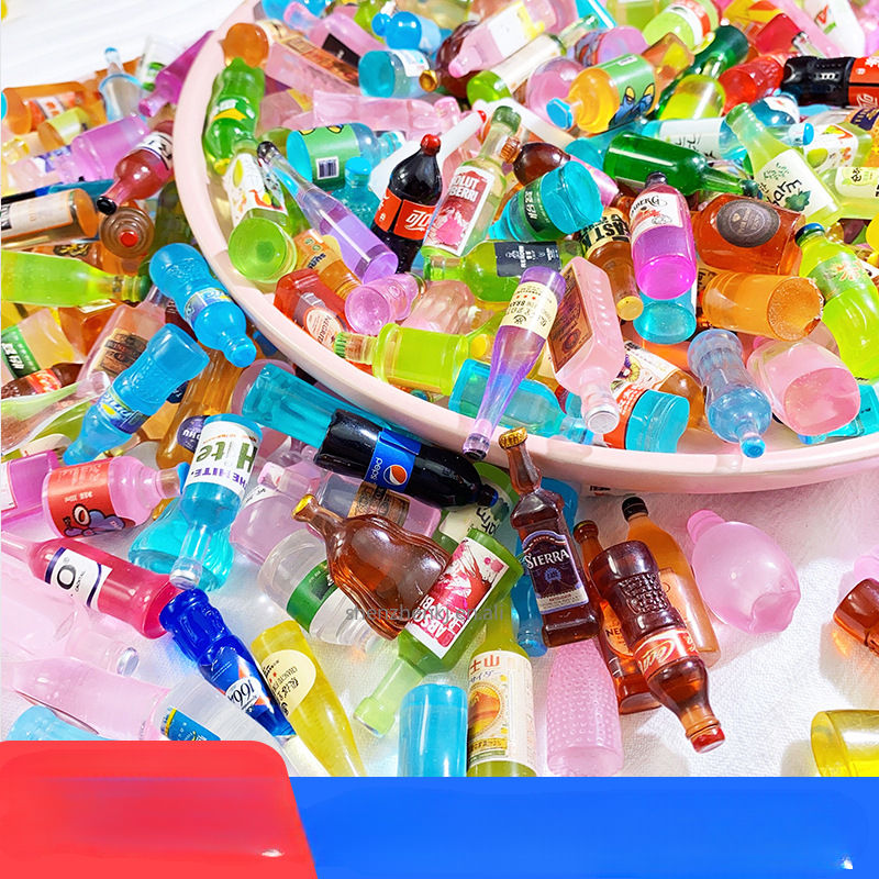 Collection of Miniature Mini Cool Drinks displayed in variant colours.